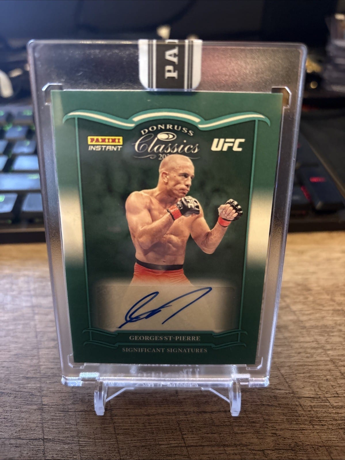 Georges St-Pierre 2023 Panini Instant UFC Donruss Classics Auto #10/10 Green, photo
