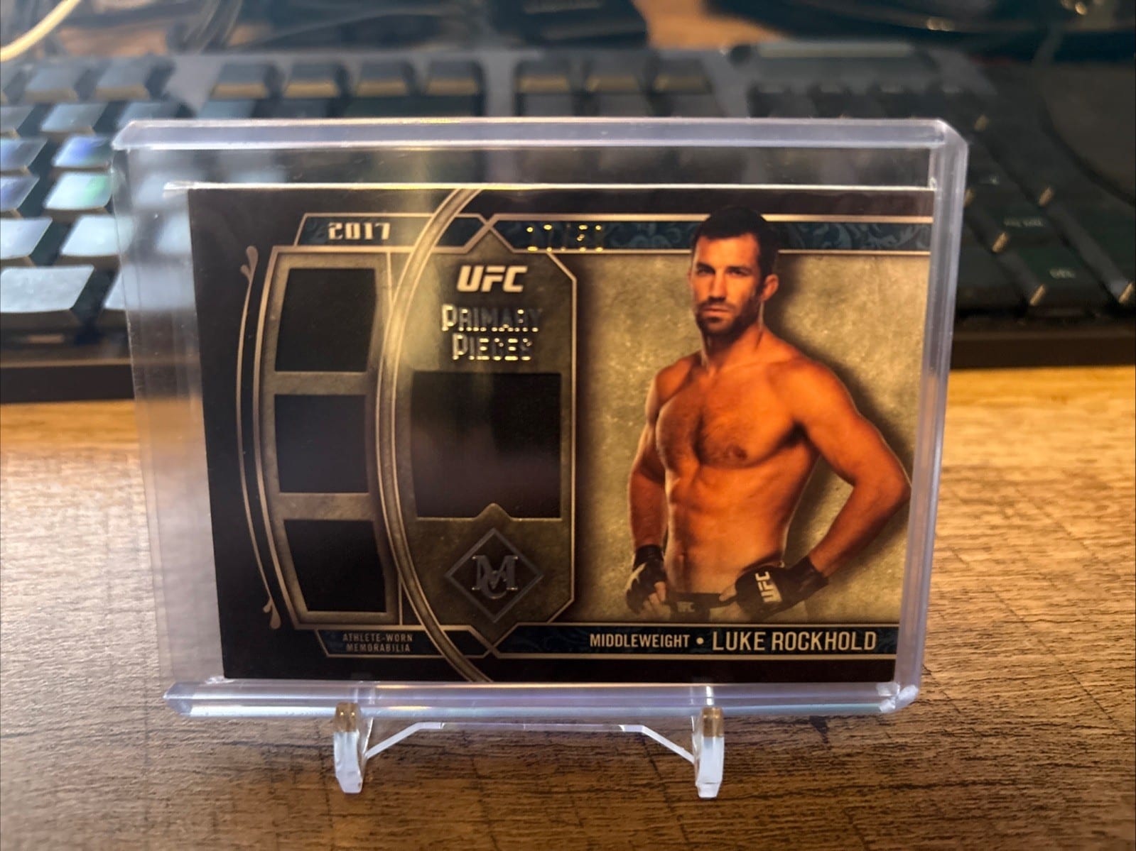 Luke Rockhold 2017 Topps UFC Museum /50 Primary Pieces Quad Relics #SPQR-LR, photo