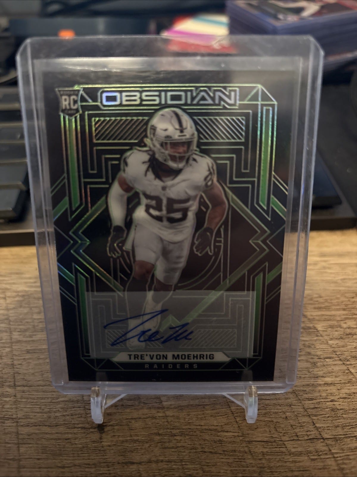 2021 Panini Obsidian Tre’Von Moehrig Auto #180 Green /50, photo